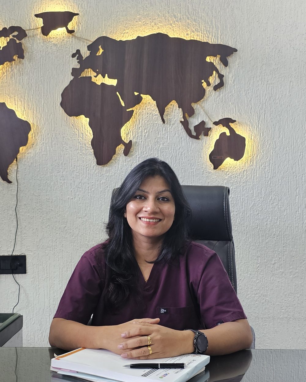 Dr. Yojna Shriwas at the consultation desk — Dr. Yojna's Dental Clinic, Vaishali Nagar, Jaipur